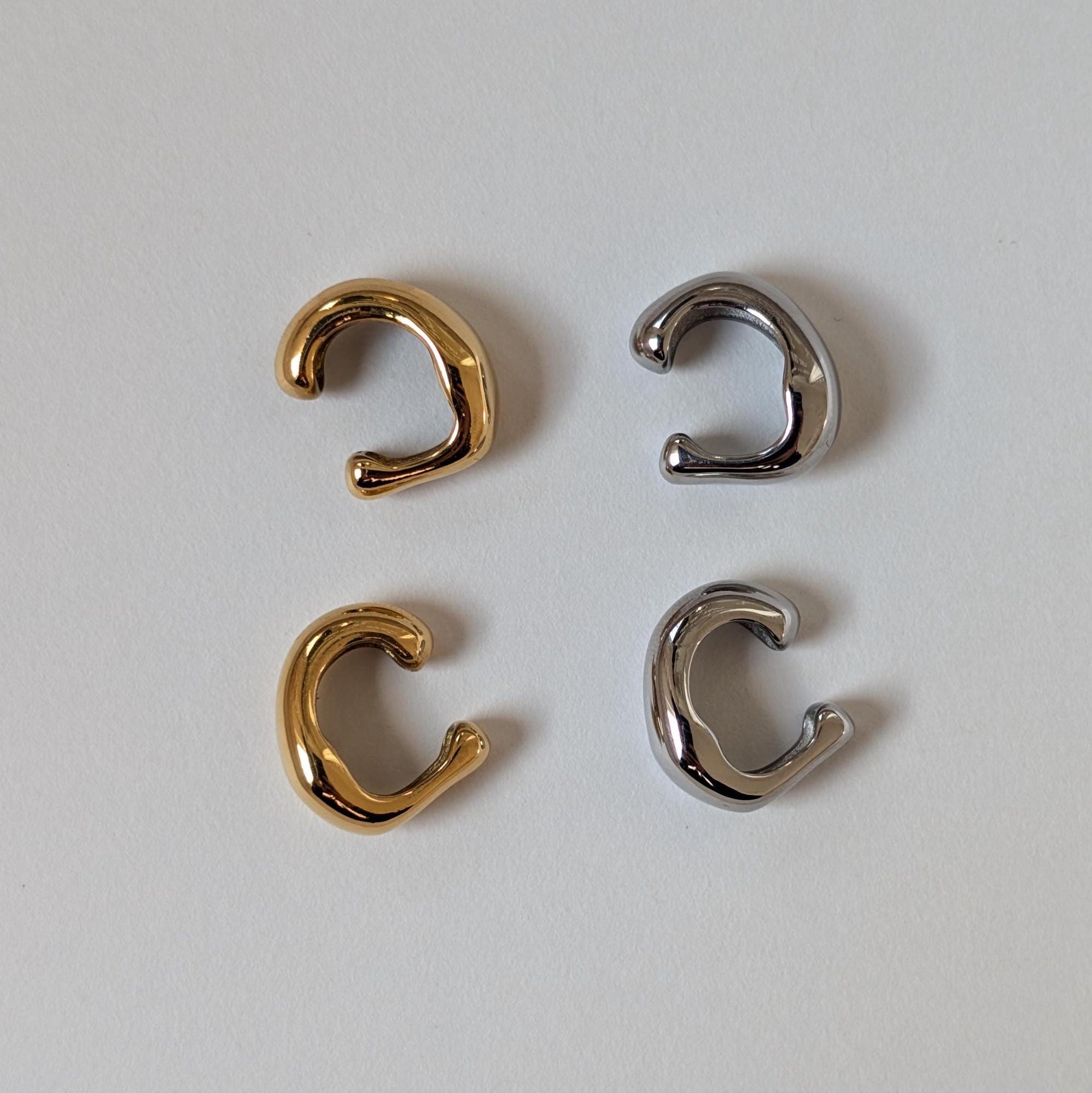 Set of ears cuffs on a white background.