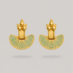 Pair of gold earrings with blue enameled designs on a light gray background