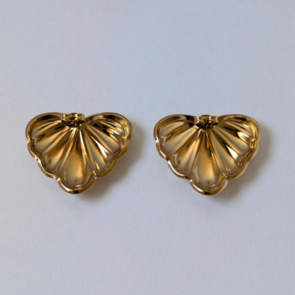 Back view with stainless‑steel post and butterfly clasp on gold palm leaf earrings.