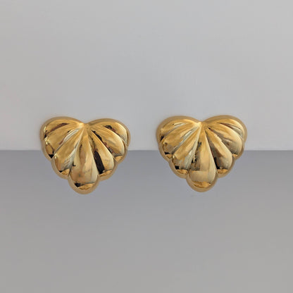 Front view of gold palm leaf statement earrings – 18k plated, high‑shine finish.
