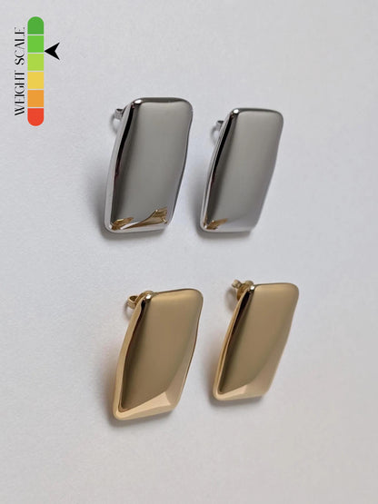 Side view comparison of gold and silver chunky rectangle stud earrings showing 5 mm depth and mirror‑polished finish.