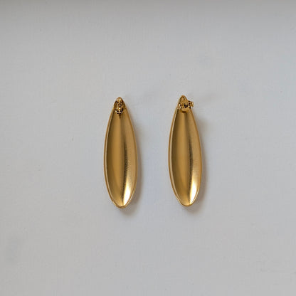 Back view with hypoallergenic 316L steel post and secure butterfly clasp on gold teardrop earrings.